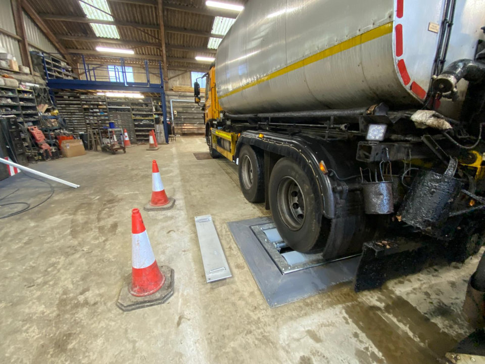 Brake testers for road maintenance vehicles