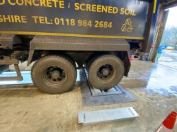 Brake testers for road maintenance vehicles
